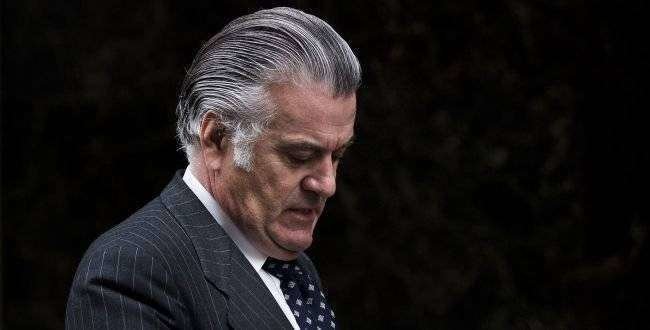Luis Barcenas leaves the National Court in Madrid, Friday, March 22, 2013