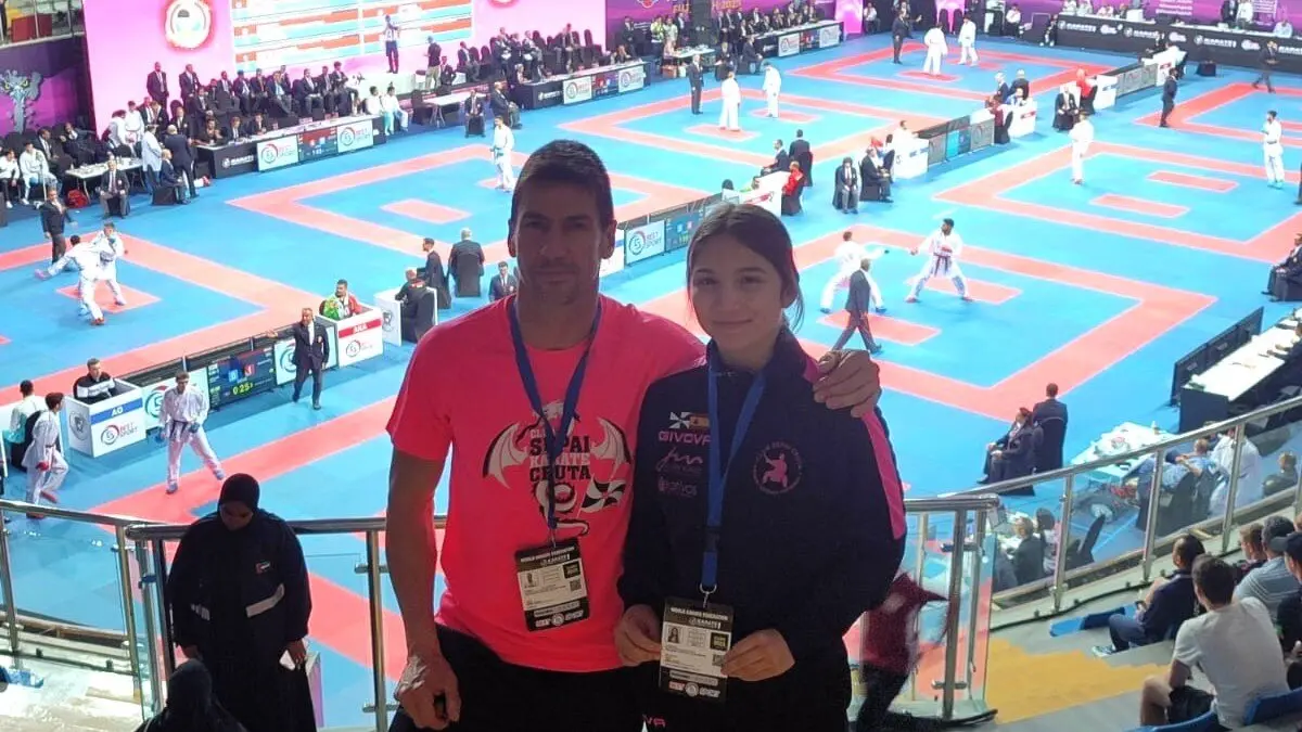 Julia Melgar y su entrenador