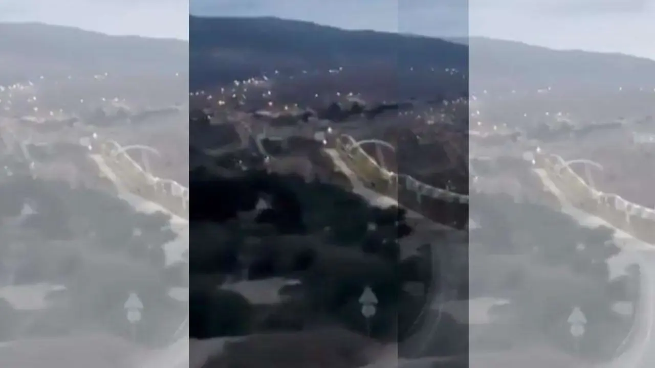 Un migrante sortea la valla de Melilla utilizando un parapente (REPRODUCCI&Oacute;N)