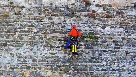 trabajador-en-vertical-1