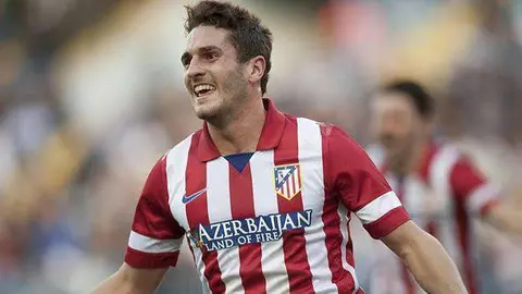 Atletico de Madrid's Jorge Resurreccion "Koke" celebrates his goal during a Spanish La Liga soccer match between Malaga and Atletico de Madrid at the La Rosaleda stadium in Malaga, Spain, Saturday, Jan. 4, 2014. (AP Photo/Daniel Tejedor)