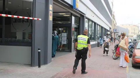 seguridad lidl vigilante calle
