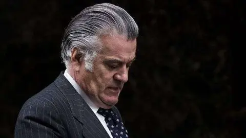Luis Barcenas leaves the National Court in Madrid, Friday, March 22, 2013