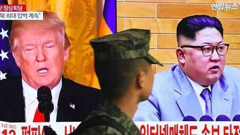 Donald Trump y Kim Jong-un en una imagen de la televisi&oacute;n surcoreana.