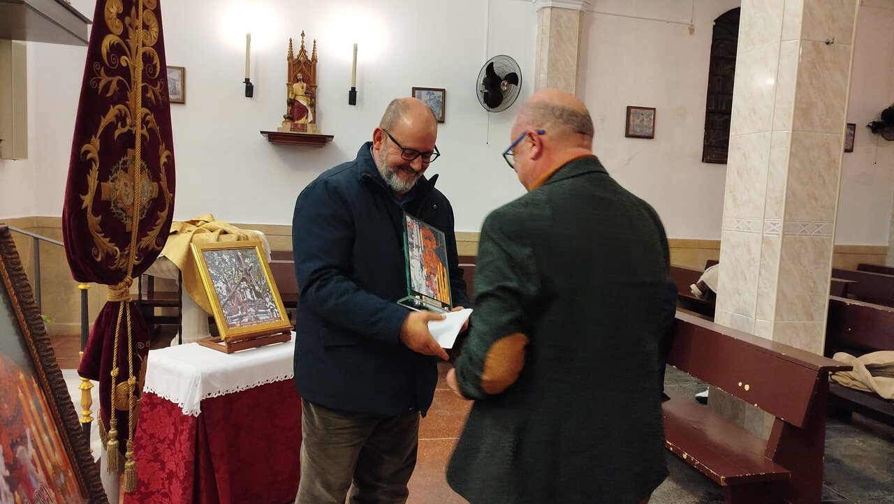la Amargura presentó en la iglesia de San Juan de Dios el cartel que anunciará su salida procesional del Miércoles Santo 2026